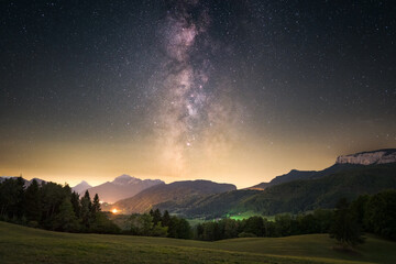 Milky way above the mountains and the trees. nightscape with the milky way