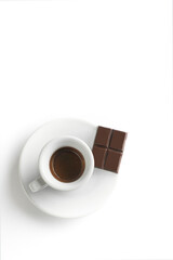 Cup of coffee with chocolate  on white background. Cup of espresso.Top view