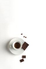Cup of coffee with chocolate  on white background. Cup of espresso.Top view