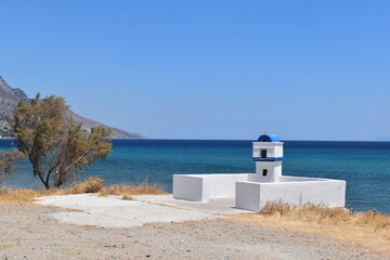 tiny greek lighthouse