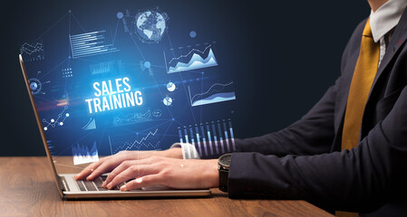 Businessman working on laptop, business concept