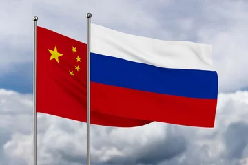 Fototapeten Chinees and Russian flag on sky background. 3D illustration © Sergey Ilin