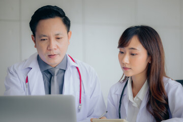 Doctor using online health consulting on computer pc and digital tablet, Tele medical healthcare...