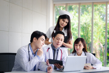 Doctor using online health consulting on computer pc and digital tablet, Tele medical healthcare concept