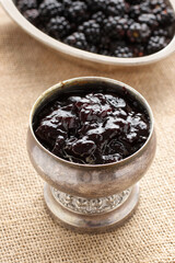 Fototapeta na wymiar Vintage bowl with blackberry jam.