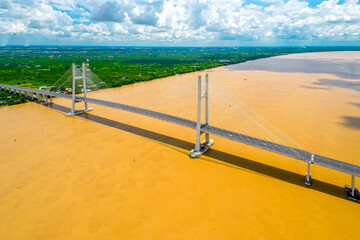 Fototapeta premium Cao Lanh bridge, Cao Lanh city, Vietnam, aerial view. Cao Lanh bridge is famous bridge in mekong delta, Vietnam.