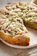 A big rhubarb cake on the table.