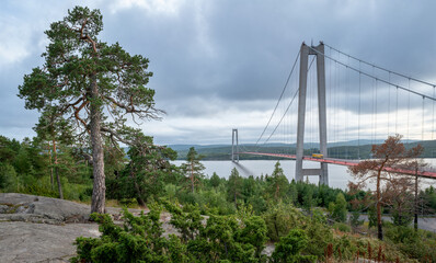 Hogakustenbron, suspension bridge in the High Coast area in Sweedn on a cloudy day. Hoga Kusten trail starting point.