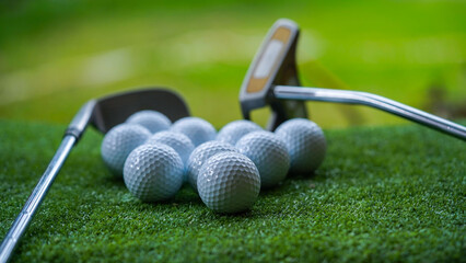 Golf club and ball in grass concept. Golf balls on the golf course with golf clubs.