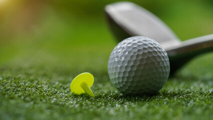 Golf club and ball in grass concept. Golf balls on the golf course with golf clubs.