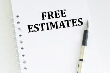 FREE ESTIMATES text on an open notepad on a bright table