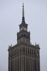 Fototapeta na wymiar Warsaw, Poland - 26.11.2021: The Palace of Culture and Science is a remarkably tall building in the center of Warsaw, Poland