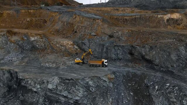 a truck working  in black dast wild close
