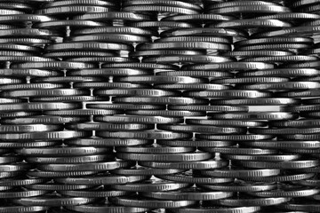 Money wall. Chaotic pile of coins close-up. Nickel coin texture. Business background made of many...
