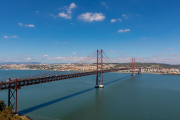 The 25 de Abril Bridge (Ponte 25 de Abril) is a suspension bridge connecting the city of Lisbon capital of Portugal, to the municipality of Almada on the left (south) bank of the Tagus river.