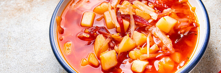 red vegetable soup borsch beetroot, cabbage, tomato, onion healthy meal food snack diet on the table copy space food background rustic top view keto or paleo diet veggie vegan or vegetarian food