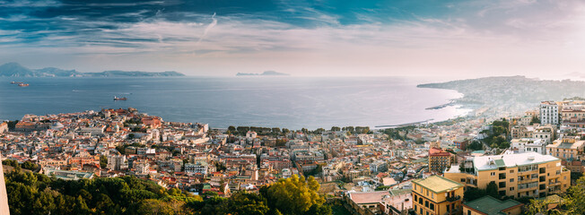 Naples, Italy. Top View Cityscape Skyline With Famous Landmarks And Part Of Gulf Of Naples In Sunny...