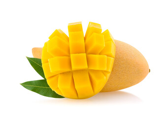 Isolated yellow mango. One whole mango fruit with leaf with cut out piece isolated on white background