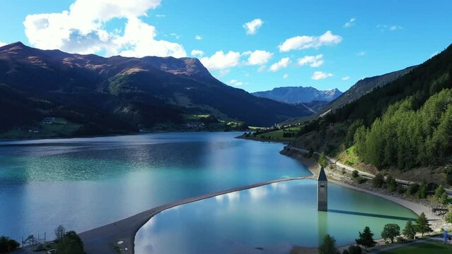 drone flight over Lake Reschensee in South Tyrol