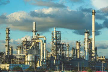 Obraz na płótnie Canvas Scene evening of tank oil refinery plant tower and column tank oil of Petrochemistry industry