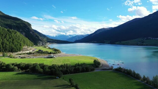 drone flight over Lake Reschensee in South Tyrol