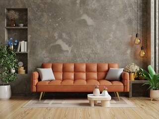 Living room in loft have orange leather sofa and decoration minimal on concrete wall.