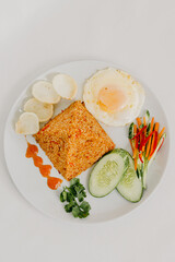 Fried rice with sunny side egg on the plate