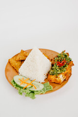 RIce with green chili chicken on the plate