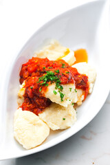 homemade gnocchi with tomato sauce