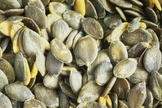 Close up picture of pumpkin seeds, selective focus.