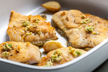 salmon trout baked with garlic