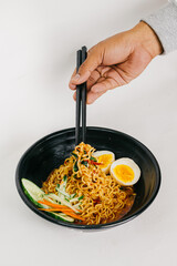 Indomie Soup with eggs on the bowl