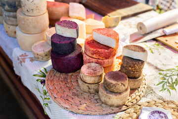 Handmade farm cheese on the counter of the market, fair.