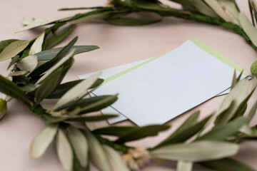 a laurel wreath on a holiday. Close-up of laurel for guests at a wedding or birthday party in a restaurant. The style of preparations for the holiday.