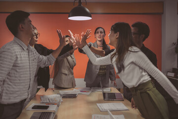 Cheerful International business male and female meeting group. Business company team about to start...