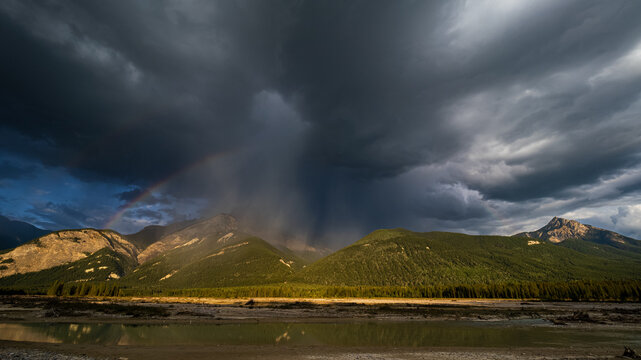 Dark Clouds Over Blaeberry River In Golden, British Columbia