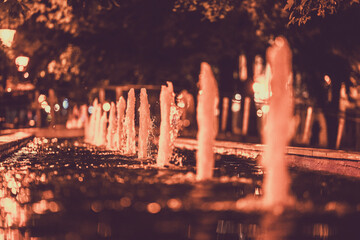Cinematic photo of a fountain at night