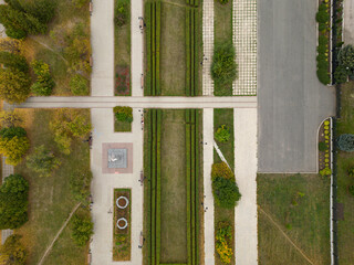 Panoramic view from a drone to a walking park near residential buildings. Urban landscape,...