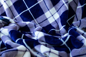 アーガイル模様の毛布の背景（紺と白）