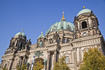 Detail of the ornate Neo-Renaissance facade and dome of the Berliner Dom, Berlin Cathedral, on the...