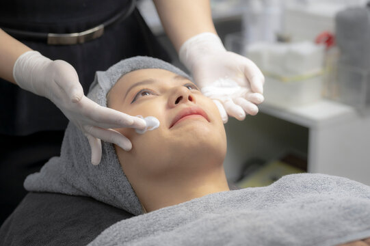 Young women facials from beauty experts.