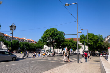  People walking nearby Rossio square in Lisbon 