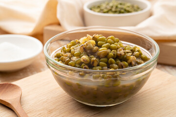 Green Beans in Syrup in glass bowl,Thai Dessert on wooden table