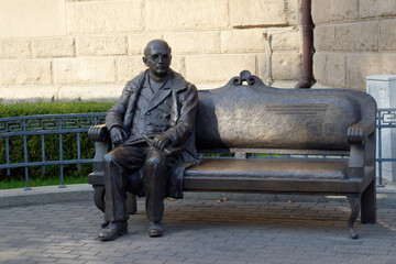 Naklejka premium Stanislaw Kozerowski's bench in Poznan is a monumental bench in memory of fr. prof. Stanislav Kozerovsky, one of the founders of Wszechnica Piastowska, the current Adam Mickiewicz University in Poznan