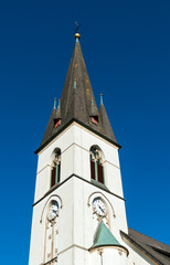 Fototapeta na wymiar Turm der neugotischen Pfarrkirche St. Johannes Baptist in Düdinghausen, Hochsauerland