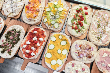 Raw pizzas