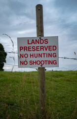 Fototapeta premium Lands preserved, no hunting, no shooting sign in rural Ireland