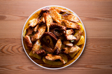 Galician-style octopus or feira-style octopus. Tapa recipe typical of the north of Spain from the region of Galicia. Octopus cooked with paprika and potato.