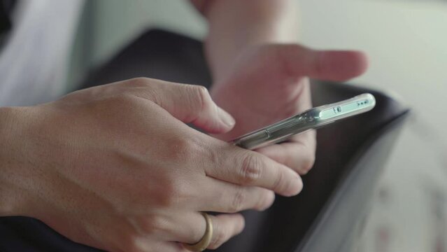 Close up man hands holding using mobile smart phone for everywhere connection, such as online social, media application, online shopping, surfing internet and working