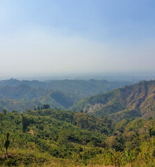 View of the hills of Bandarban, Bangladesh from top of a famous hill during the summer. Hills of bangladesh